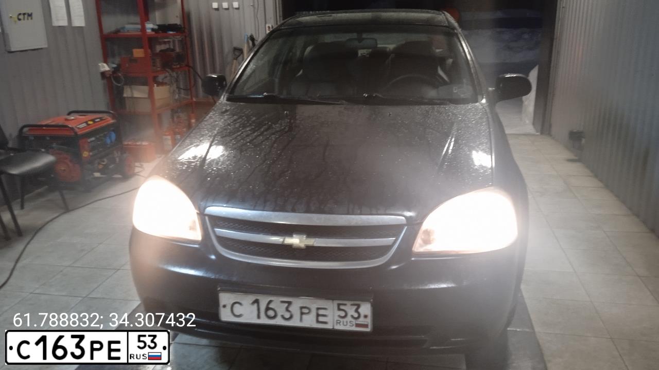 Фото автомобиля CHEVROLET LACETTI, 2006 — госномер О402ТА60. Цвет: ЧЕРНЫЙ