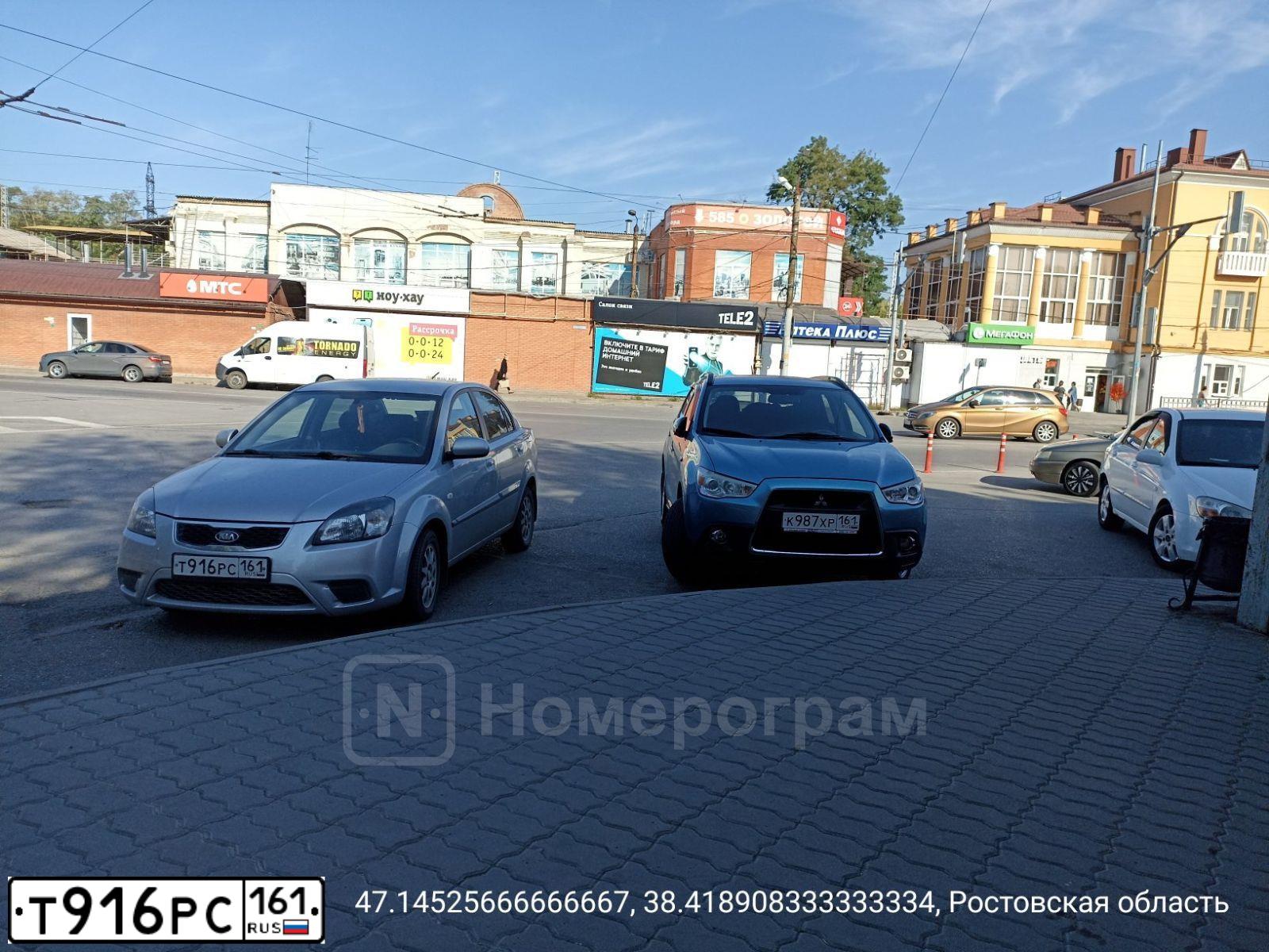 Фото автомобиля KIA RIO, 2010 — госномер Т916РС161. Цвет: Серебристый