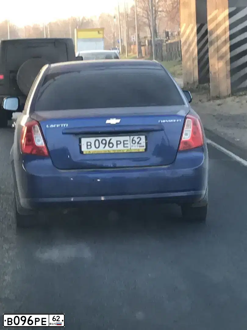 Фото автомобиля CHEVROLET LACETTI, 2011 — госномер В096РЕ62. Цвет: СИНИЙ