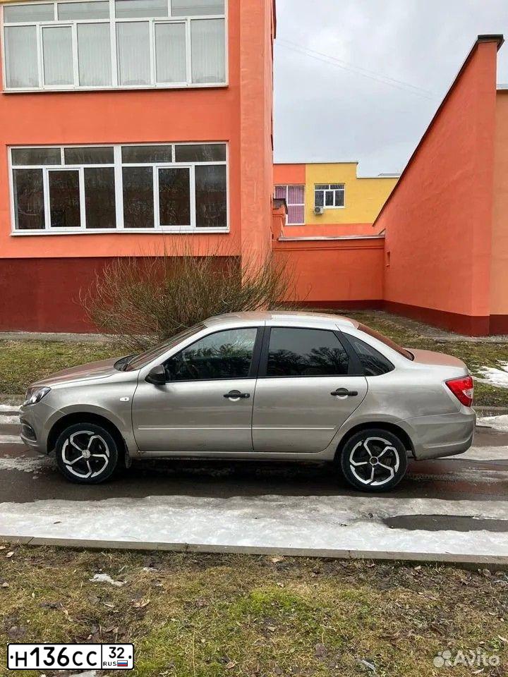 Фото автомобиля LADA GRANTA, 2020 — госномер О148ХЕ46. Цвет: СЕРЫЙ