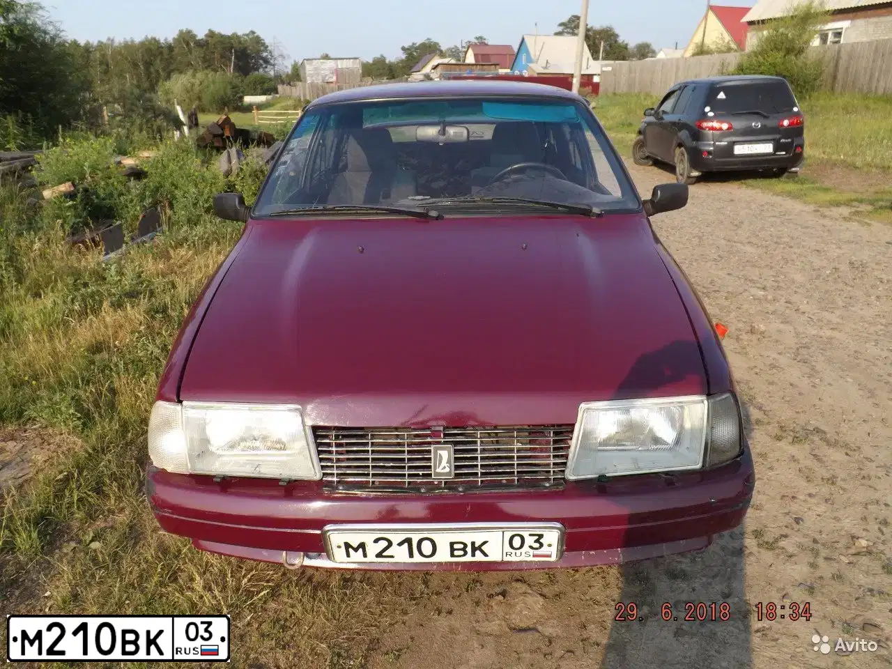 Фото автомобиля ИЖ 2126, 2003 — госномер Е843МК03. Цвет: КРАСНЫЙ ГРАНАТ