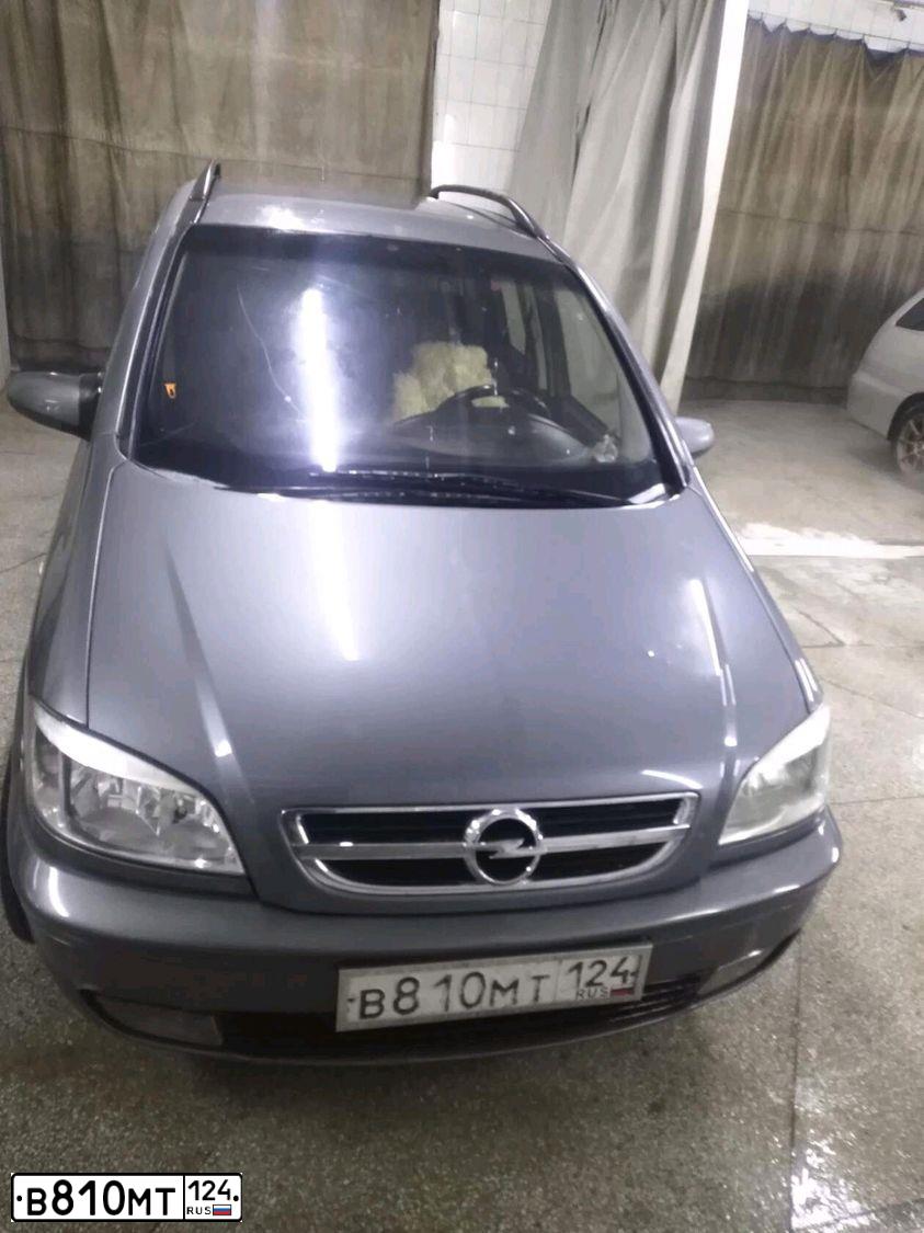 Фото автомобиля OPEL ZAFIRA, 2004 — госномер В810МТ124. Цвет: СЕРЫЙ
