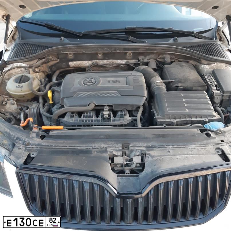 Фото автомобиля SKODA OCTAVIA, 2013 — госномер Е130СЕ82. Цвет: БЕЛЫЙ