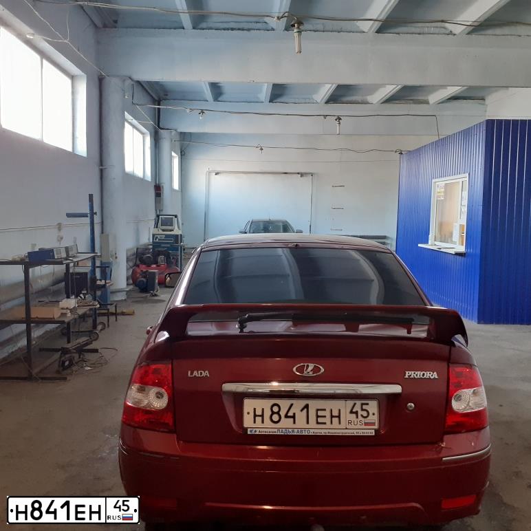 Фото автомобиля LADA 2172 PRIORA, 2008 — госномер Т579НЕ45. Цвет: ЗОЛОТИСТО-КРАСНЫЙ