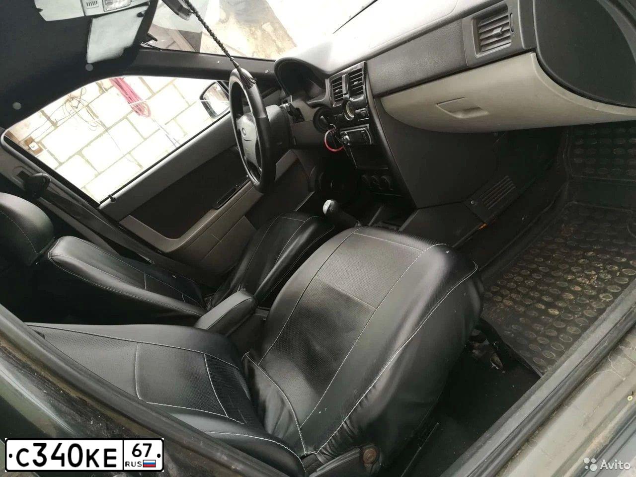 Фото автомобиля LADA 2112, 2004 — госномер С340КЕ67. Цвет: СЕРЕБРИСТЫЙ
