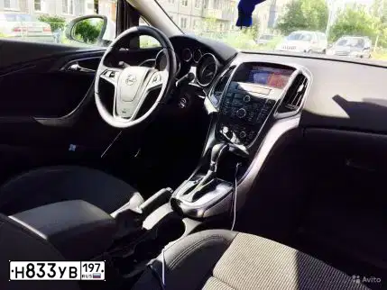 Фото автомобиля OPEL ASTRA, 2012 — госномер Т914ЕС71. Цвет: Белый