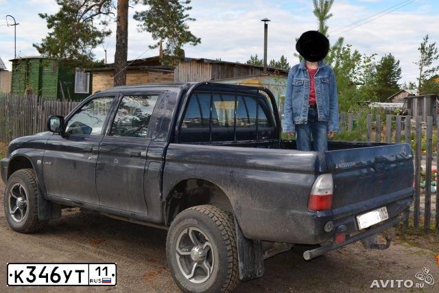 Фото автомобиля MITSUBISHI L 200, 2005 — госномер К346УТ11. Цвет: ЧЕРНЫЙ