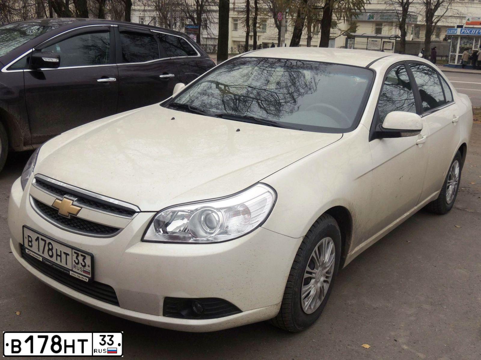Фото автомобиля CHEVROLET EPICA, 2011 — госномер Т001ТО33. Цвет: Белый
