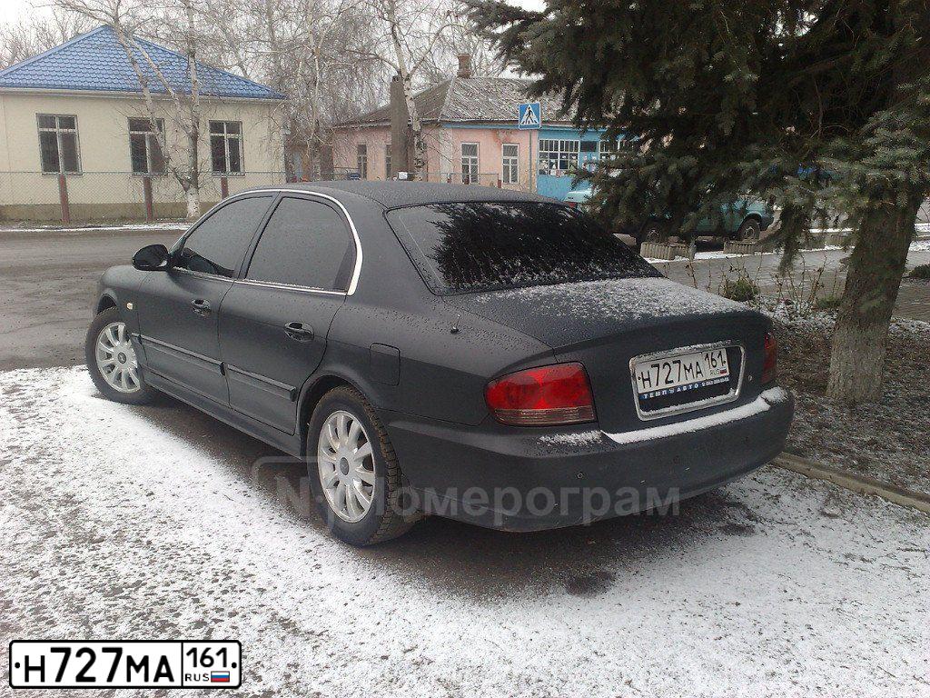Фото автомобиля TAGAZ Z SONATA, 2007 — госномер М164АЕ761. Цвет: ЧЕРНЫЙ