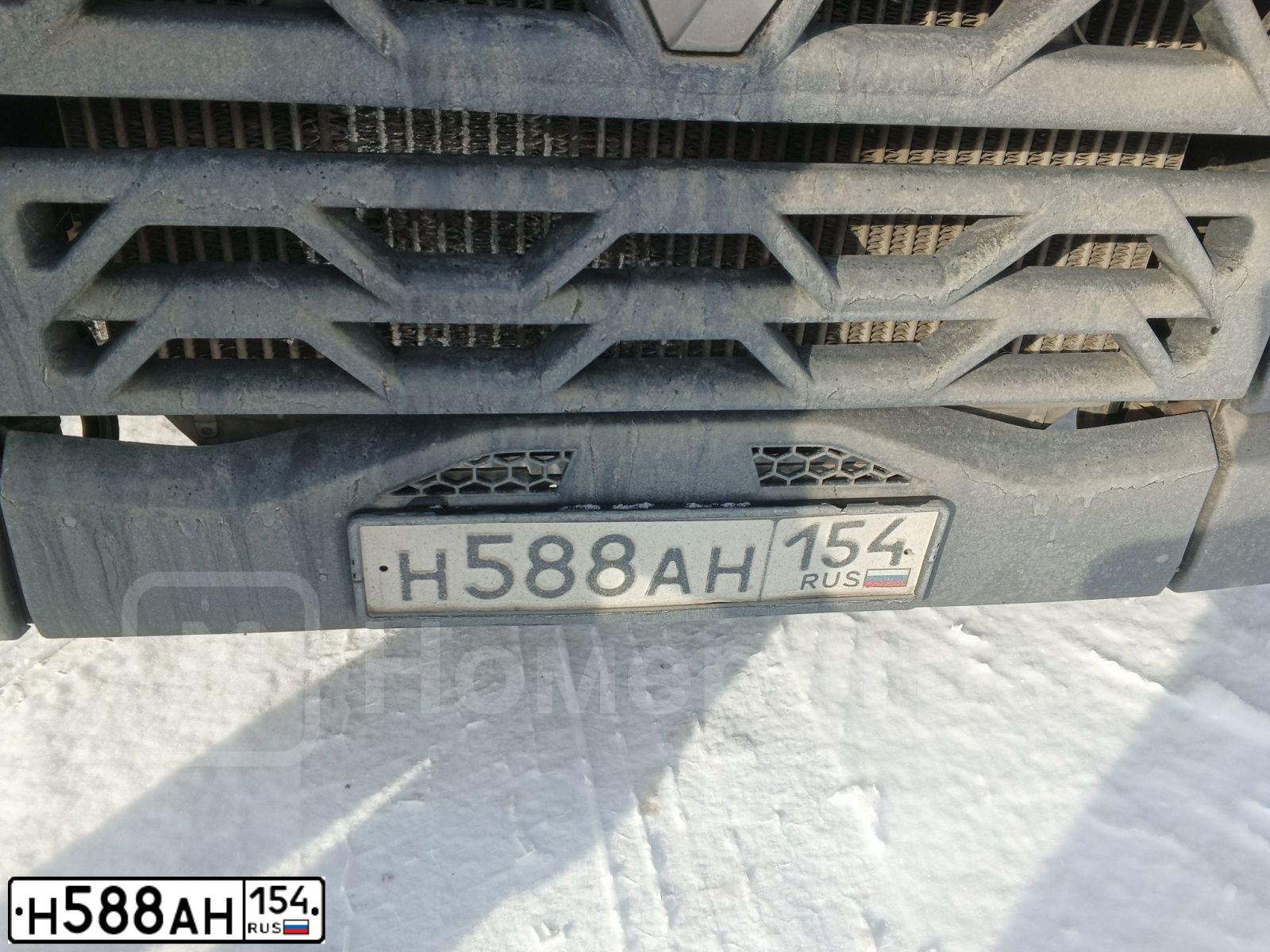 Фото автомобиля RENAULT T-SERIE, 2018 — госномер Н588АН154. Цвет: синий