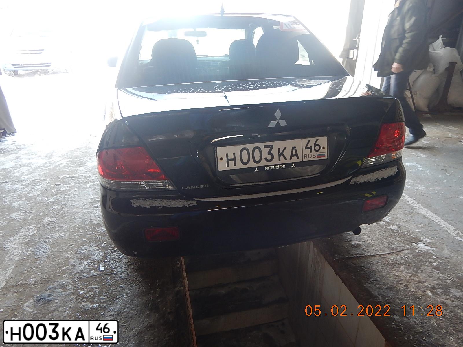 Фото автомобиля MITSUBISHI LANCER, 2005 — госномер А304ЕМ177. Цвет: ЧЕРНЫЙ
