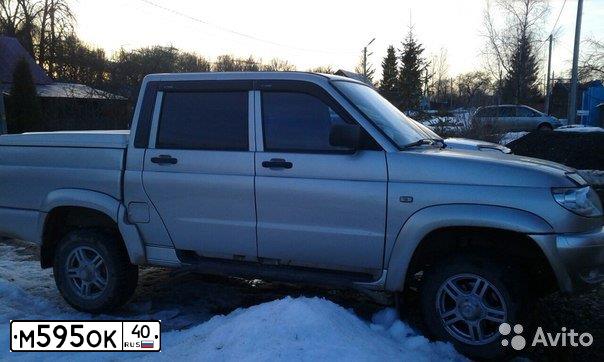 Фото автомобиля UAZ 2363 PICKUP, 2011 — госномер М595ОК40. Цвет: ЧЕРНЫЙ