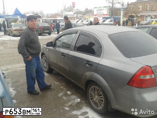 Фото автомобиля CHEVROLET AVEO, 2007 — госномер Р653ВМ161. Цвет: СЕРЫЙ