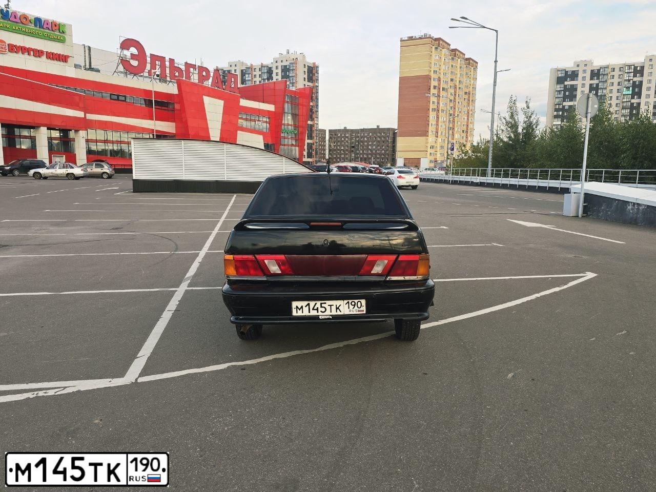 Фото автомобиля LADA 2115 SAMARA, 2001 — госномер М145ТК190. Цвет: КРАСНЫЙ ЧЕРНЫЙ