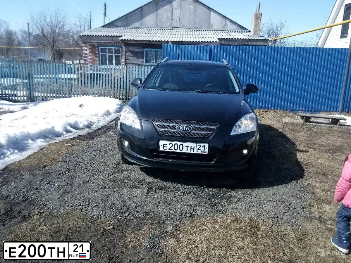 Фото автомобиля KIA CEE'D, 2008 — госномер Е200ТН21. Цвет: ЧЕРНЫЙ ПЕРЛАМУТР