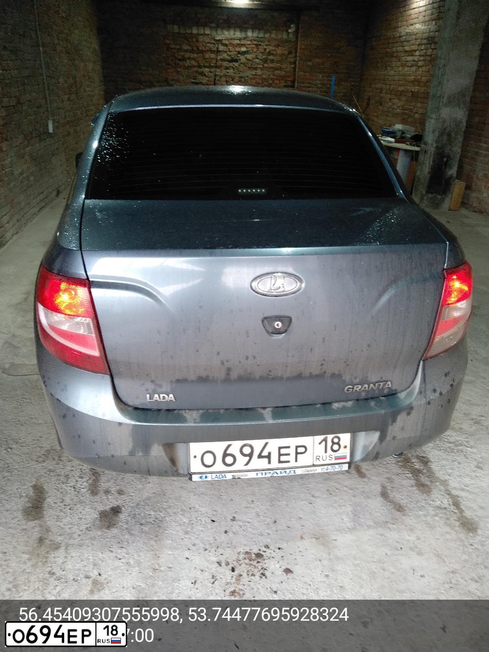 Фото автомобиля LADA 2190 GRANTA, 2014 — госномер О694ЕР18. Цвет: СЕРО-СИНИЙ