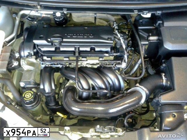 Фото автомобиля FORD FOCUS, 2008 — госномер Х954РА52. Цвет: СВЕТЛО-СЕРЫЙ