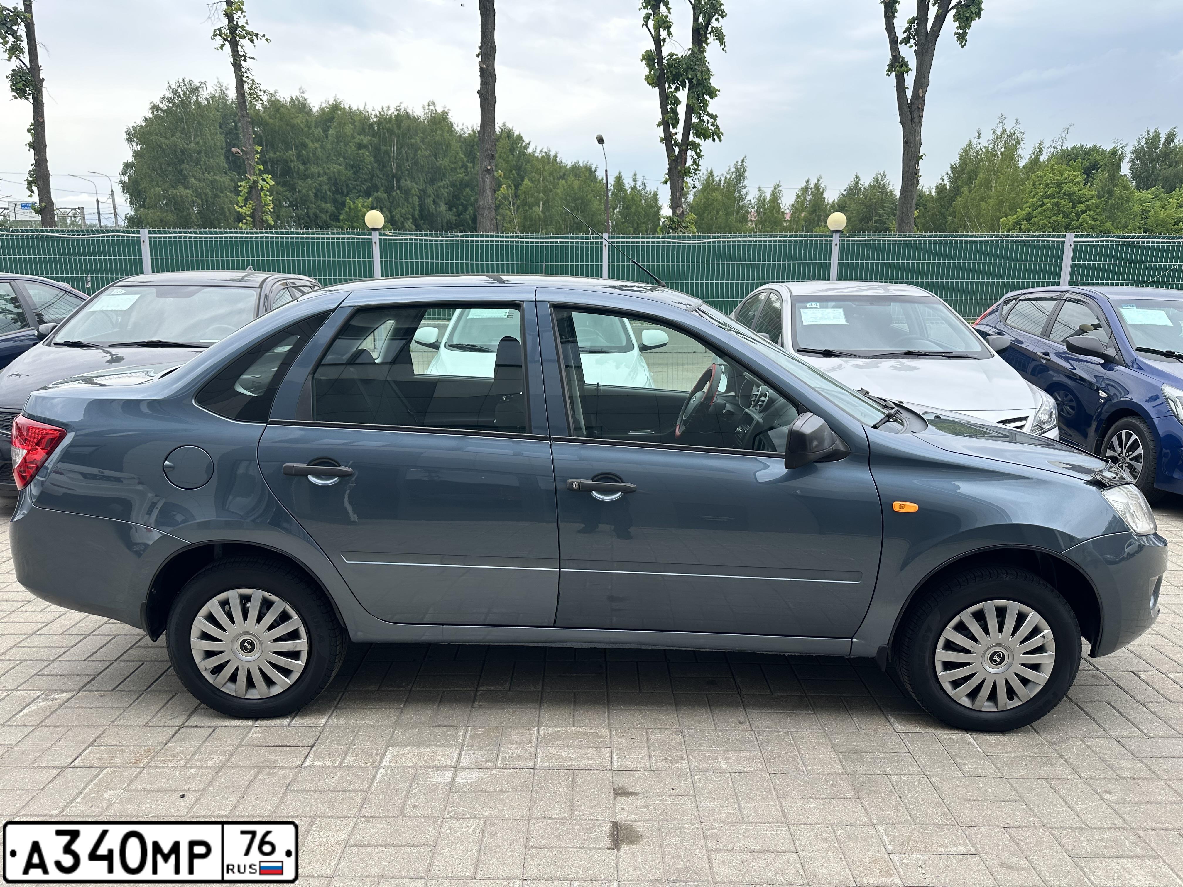 Фото автомобиля LADA 2190 GRANTA, 2014 — госномер А340МР76. Цвет: СЕРО-СИНИЙ
