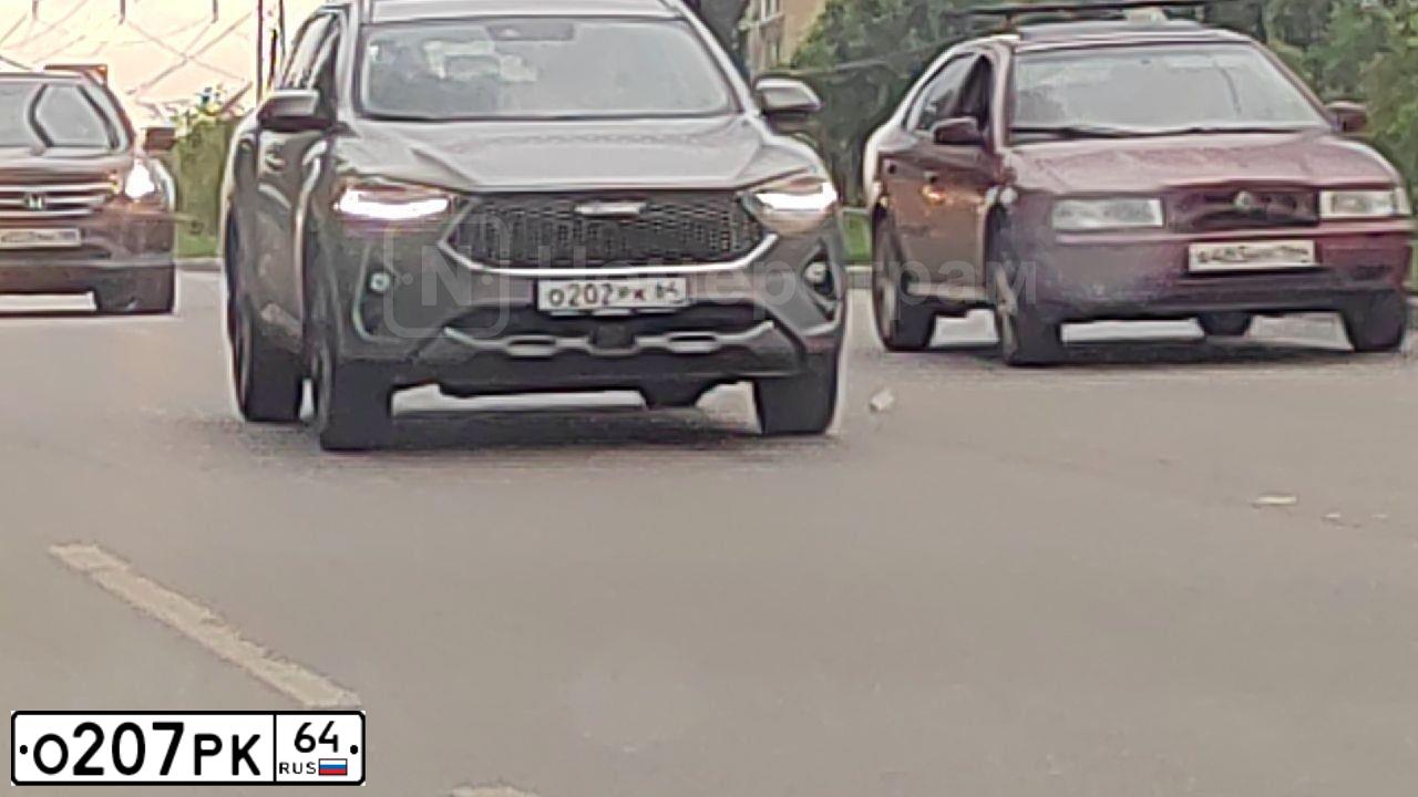 Фото автомобиля RENAULT MEGANE, 2007 — госномер Х845НО64. Цвет: ТЕМНО СЕРЫЙ
