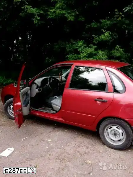 Фото автомобиля LADA 1118 KALINA, 2006 — госномер О239ВК46. Цвет: СЕРЕБРИСТО - КРАСНЫЙ