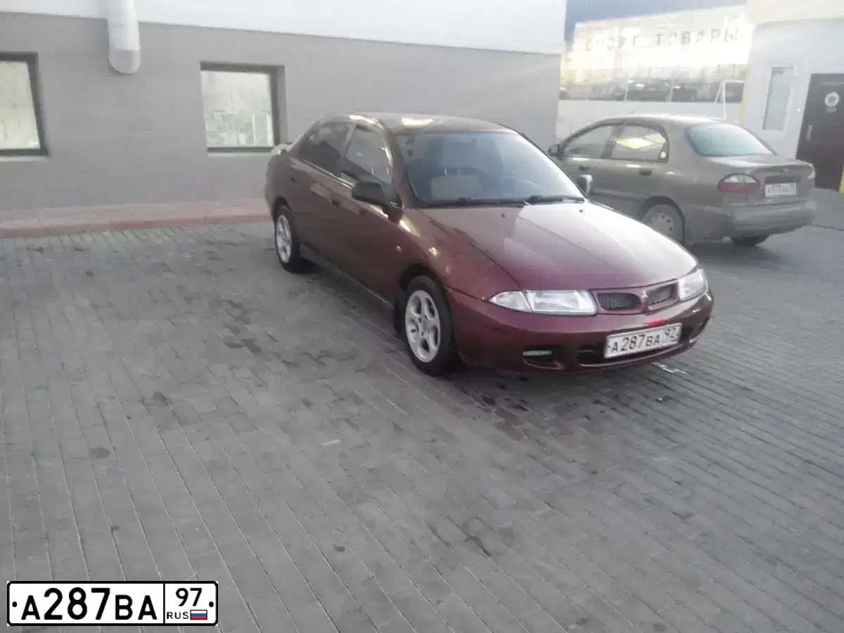Фото автомобиля RENAULT LAGUNA, 2002 — госномер С281РО62. Цвет: ЧЕРНЫЙ