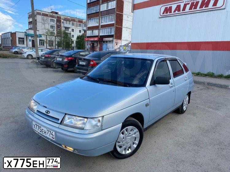 Фото автомобиля LADA 2112, 2005 — госномер Х775ЕН774. Цвет: Серебристый