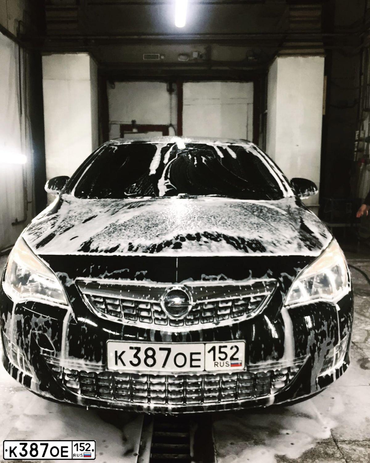 Фото автомобиля OPEL ASTRA, 2011 — госномер К387ОЕ152. Цвет: ЧЕРНЫЙ