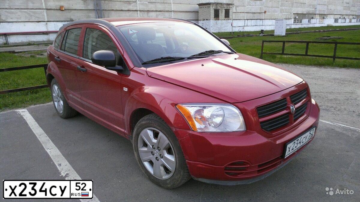 Фото автомобиля DODGE CALIBER, 2008 — госномер Р503КР152. Цвет: Красный