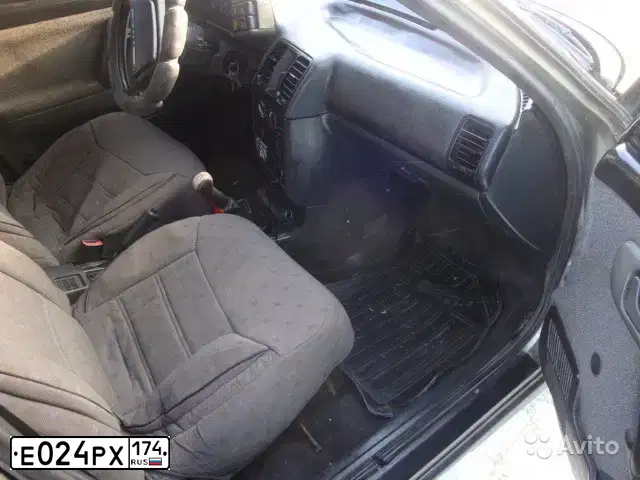 Фото автомобиля LADA 2110, 2000 — госномер Е024РХ174. Цвет: СЕРО-ЗЕЛЕНЫЙ