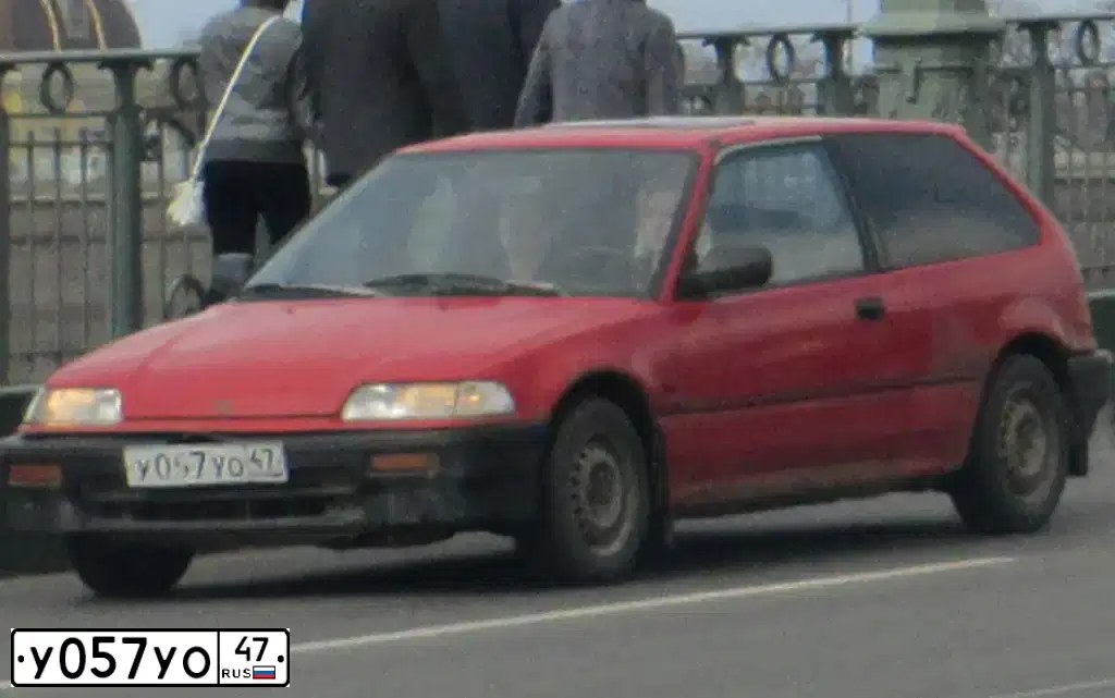 Фото автомобиля HONDA CIVIC, 1989 — госномер У057УО47. Цвет: Красный
