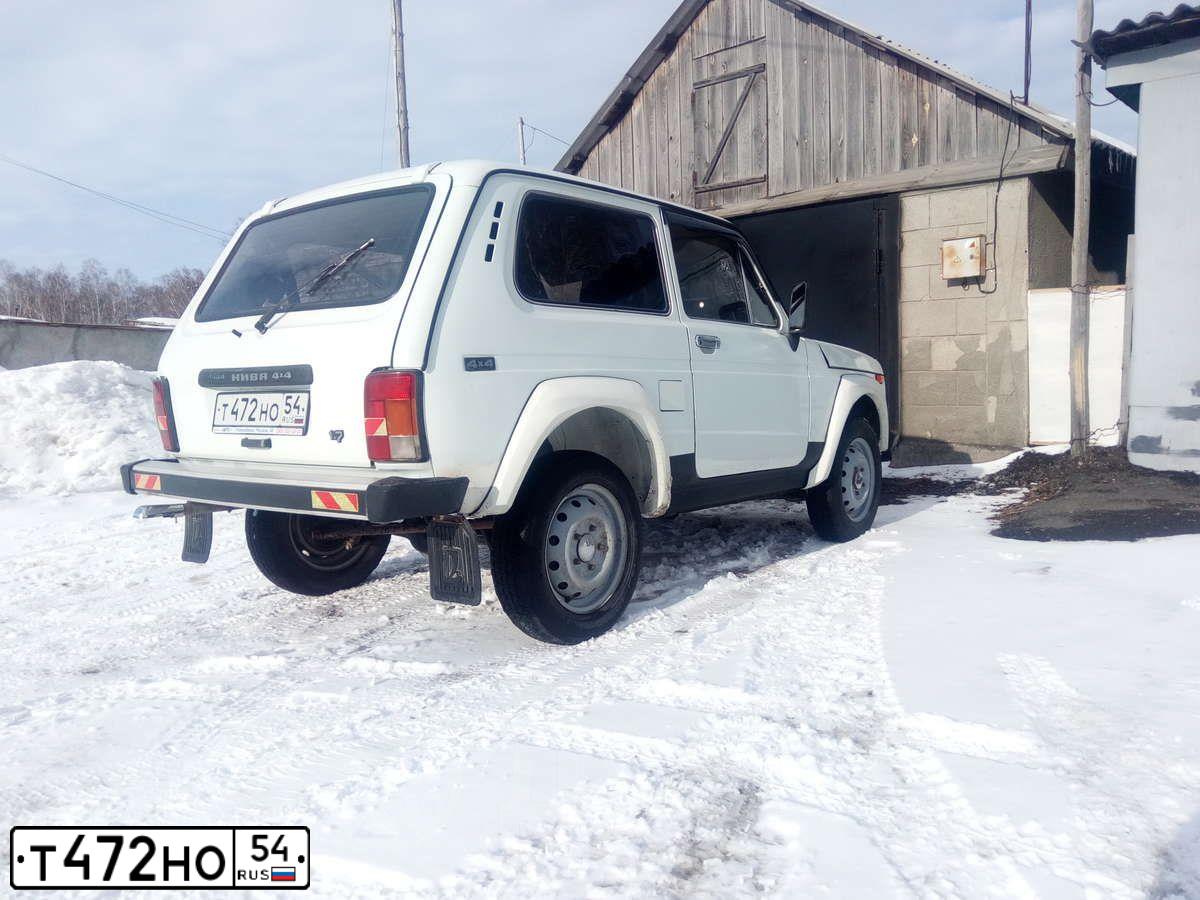 Фото автомобиля TOYOTA CAMRY, 2004 — госномер С725РМ70. Цвет: ЧЕРНЫЙ