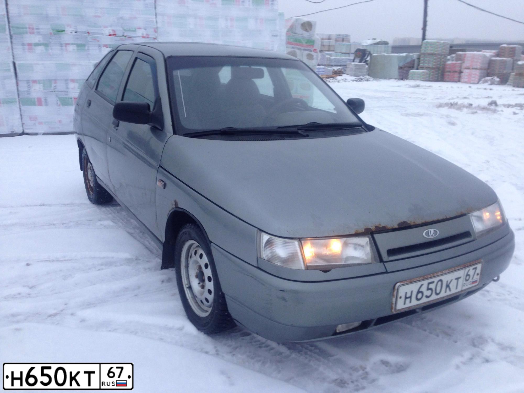Фото автомобиля LADA 2112 LADA, 2005 — госномер Н650КТ67. Цвет: СРЕДНИЙ СЕРО-ЗЕЛЕНЫЙ МЕТ