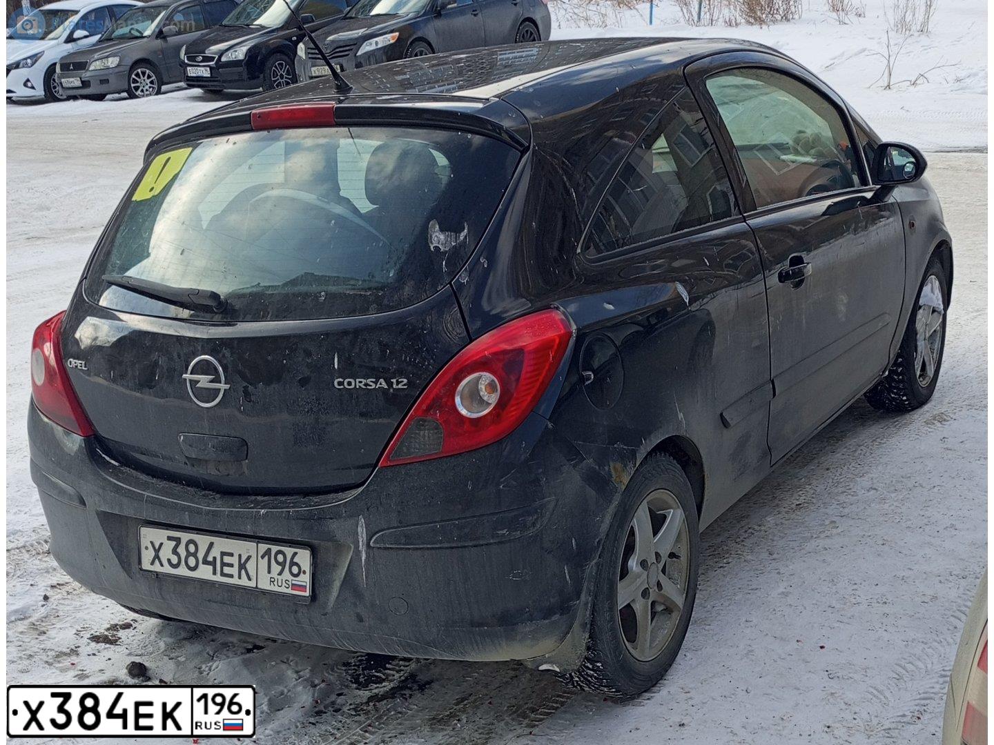 Фото автомобиля OPEL CORSA, 2007 — госномер Р024ХЕ774. Цвет: ЧЕРНЫЙ