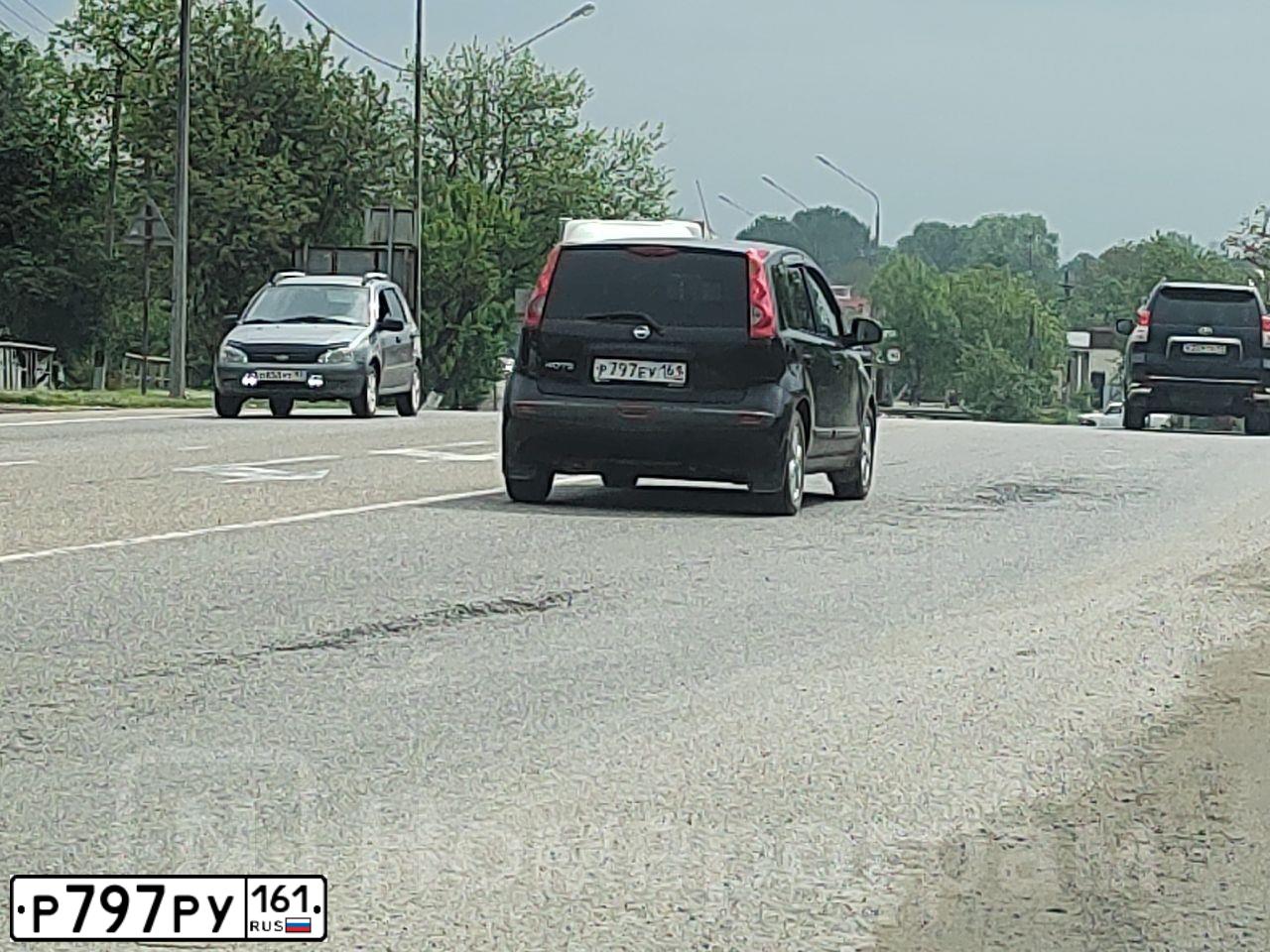 Фото автомобиля MITSUBISHI LANCER, 2012 — госномер Р797РУ161. Цвет: СЕРЕБРИСТЫЙ