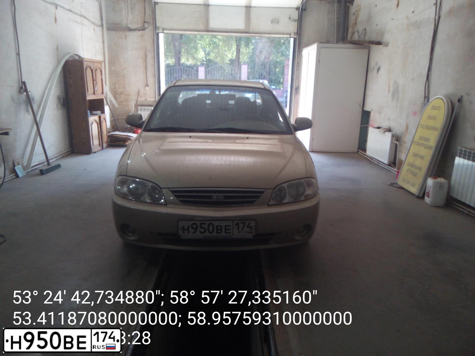 Фото автомобиля KIA SPECTRA, 2008 — госномер Н950ВЕ174. Цвет: Золотисто-бежевый