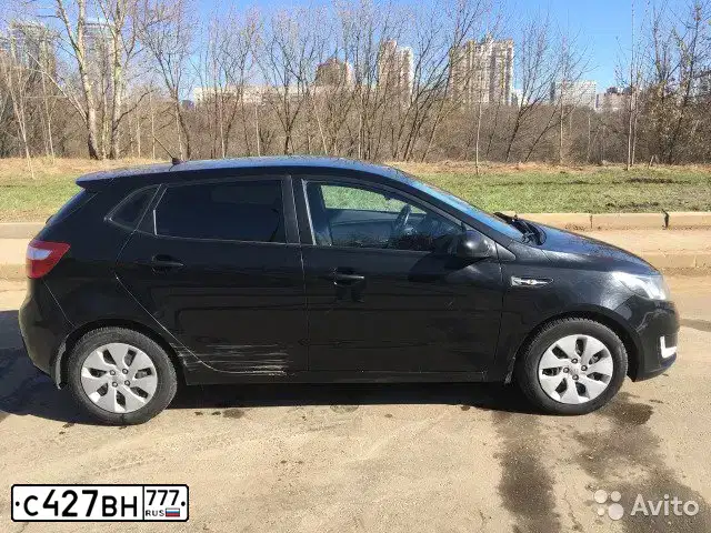 Фото автомобиля KIA RIO, 2014 — госномер С276РХ70. Цвет: ЧЕРНЫЙ