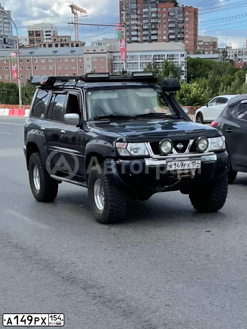 Фото автомобиля NISSAN PATROL, 1998 — госномер А149РХ154. Цвет: ТЕМНО СИНИЙ