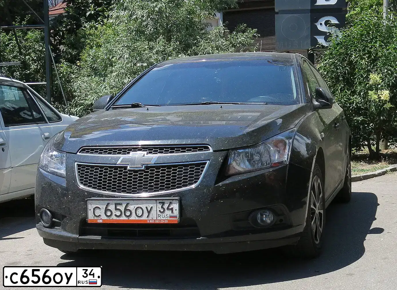 Фото автомобиля CHEVROLET CRUZE, 2012 — госномер С656ОУ34. Цвет: ЧЕРНЫЙ МЕТАЛЛИК