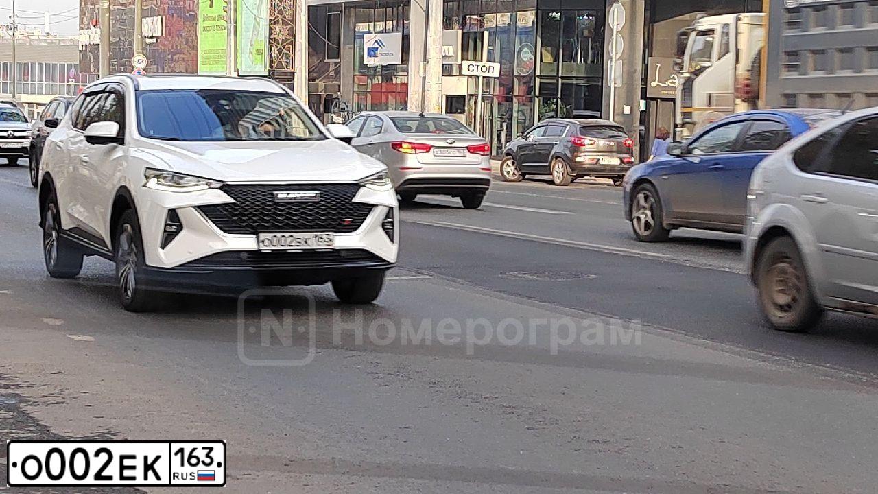 Фото автомобиля FORD FOCUS, 2010 — госномер Е163ЕЕ163. Цвет: ЧЕРНЫЙ