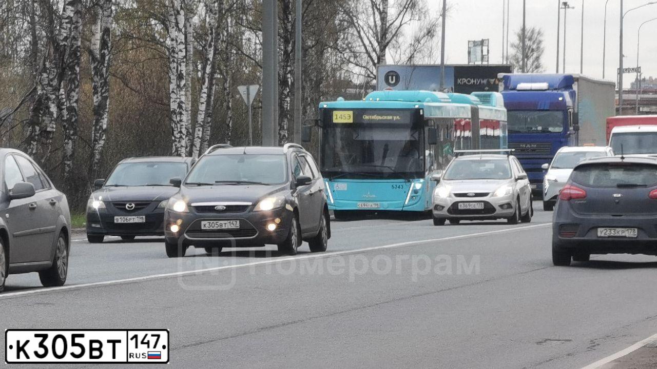 Фото автомобиля FORD FOCUS, 2010 — госномер К305ВТ147. Цвет: ТЕМНО-СЕРЫЙ