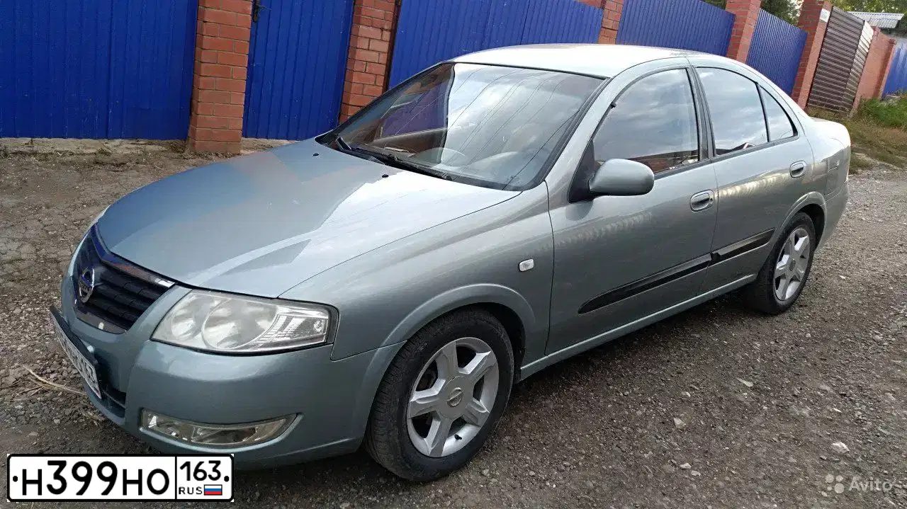 Фото автомобиля NISSAN ALMERA, 2008 — госномер В915ХС164. Цвет: СЕРО-ЗЕЛЕНЫЙ