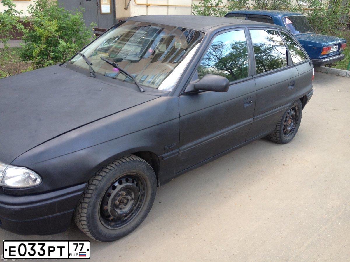 Фото автомобиля OPEL ASTRA, 1994 — госномер Т525ВТ797. Цвет: ЧЕРНЫЙ