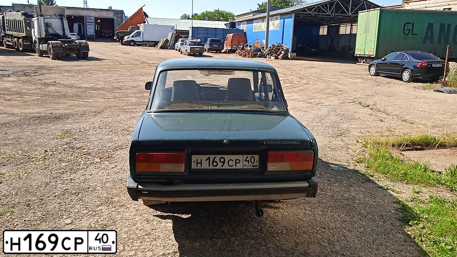 Фото автомобиля LADA 2107, 2005 — госномер Н169СР40. Цвет: СИНЕ-ЗЕЛЕНЫЙ