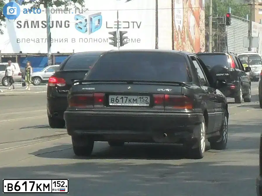 Фото автомобиля MITSUBISHI GALANT, 1991 — госномер В617КМ152. Цвет: ТЕМНО-СЕРЫЙ