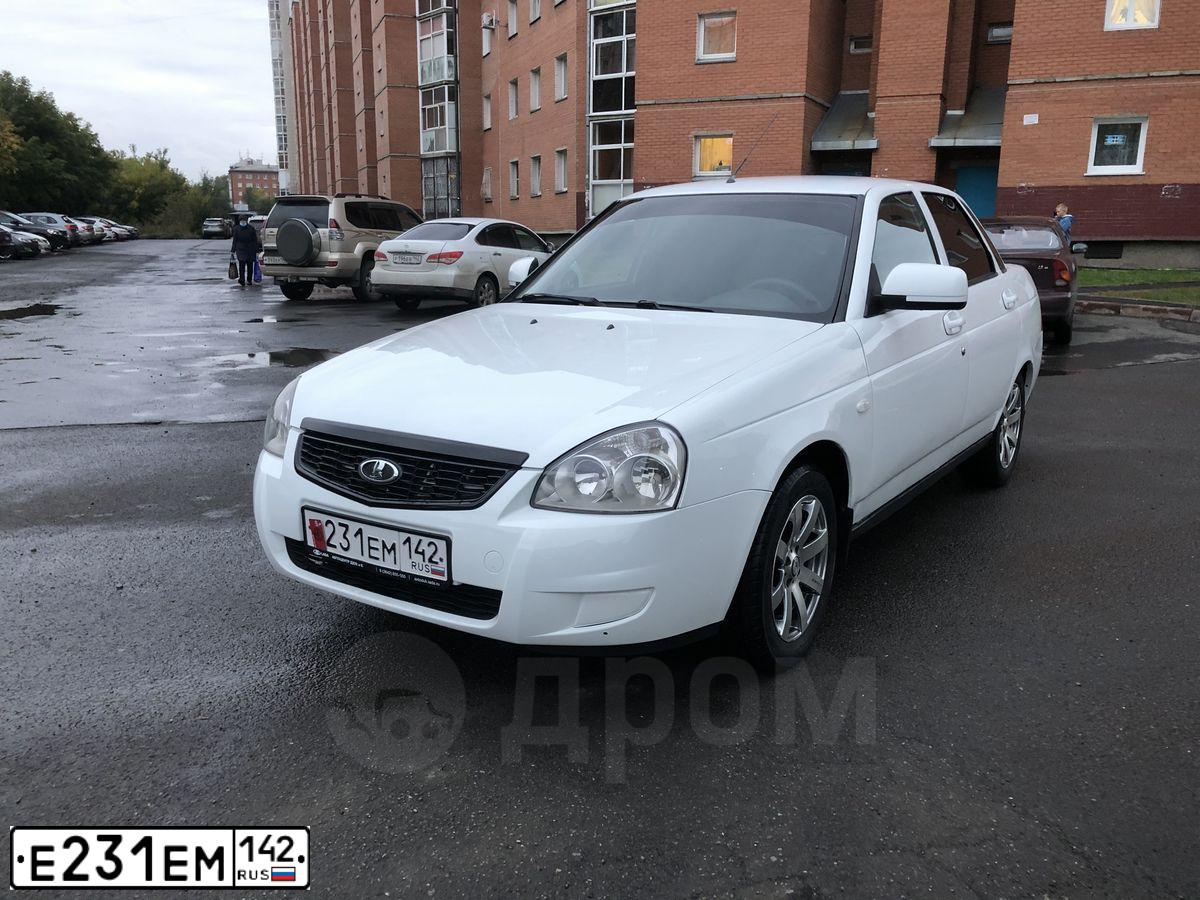 Фото автомобиля LADA 2192 KALINA, 2014 — госномер Е231ЕМ142. Цвет: СЕРО-СИНИЙ