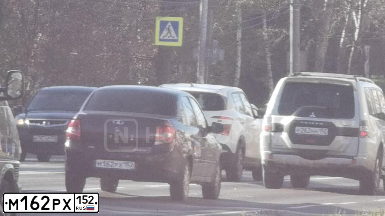 Фото автомобиля LADA 2170 PRIORA, 2013 — госномер М155РК21. Цвет: СЕРО-ЗЕЛЕНЫЙ