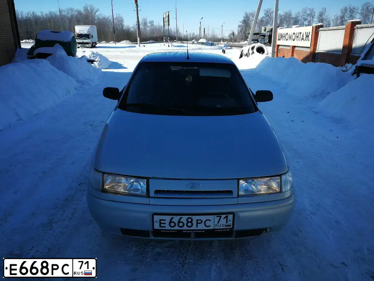 Фото автомобиля LADA 2112, 2004 — госномер Е668РС71. Цвет: Серебристо-Желтый