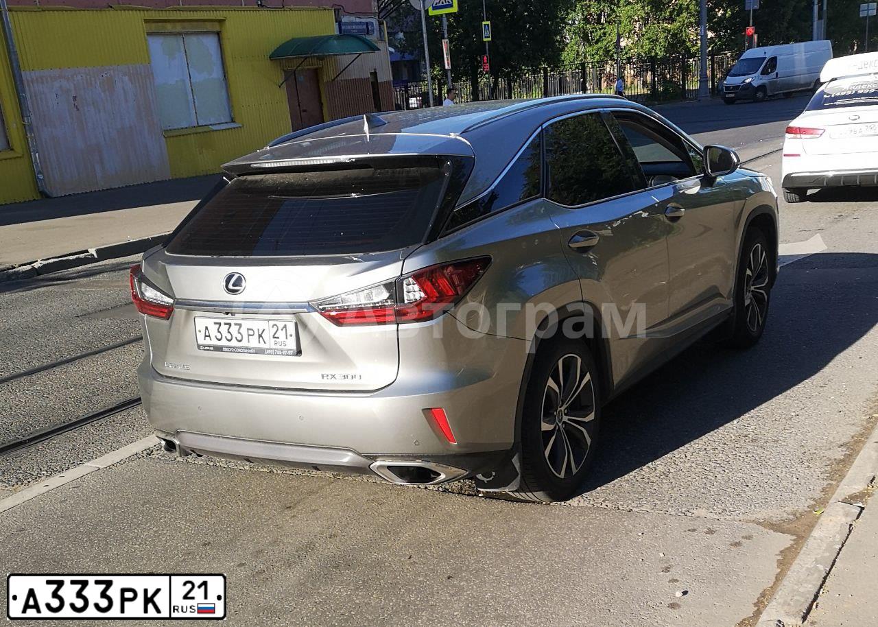 Фото автомобиля HYUNDAI IX35, 2010 — госномер А333РК21. Цвет: КРАСНЫЙ