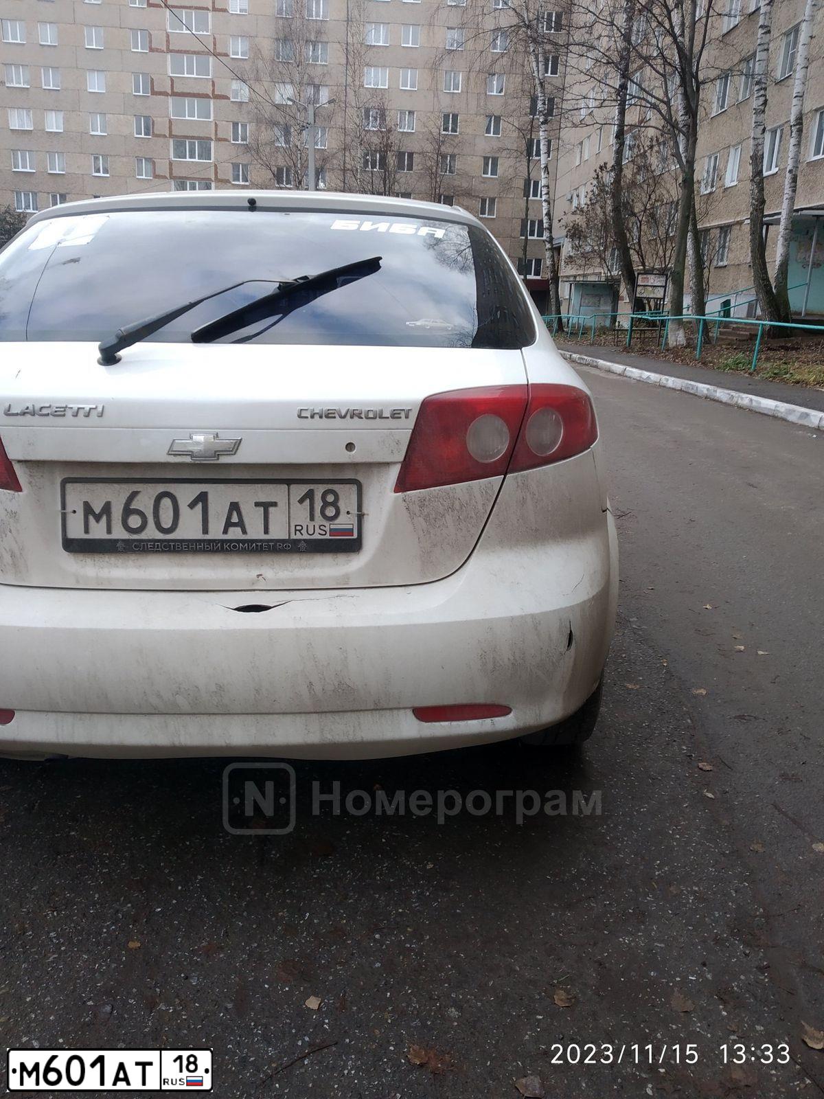 Фото автомобиля CHEVROLET LACETTI, 2006 — госномер М601АТ18. Цвет: Белый