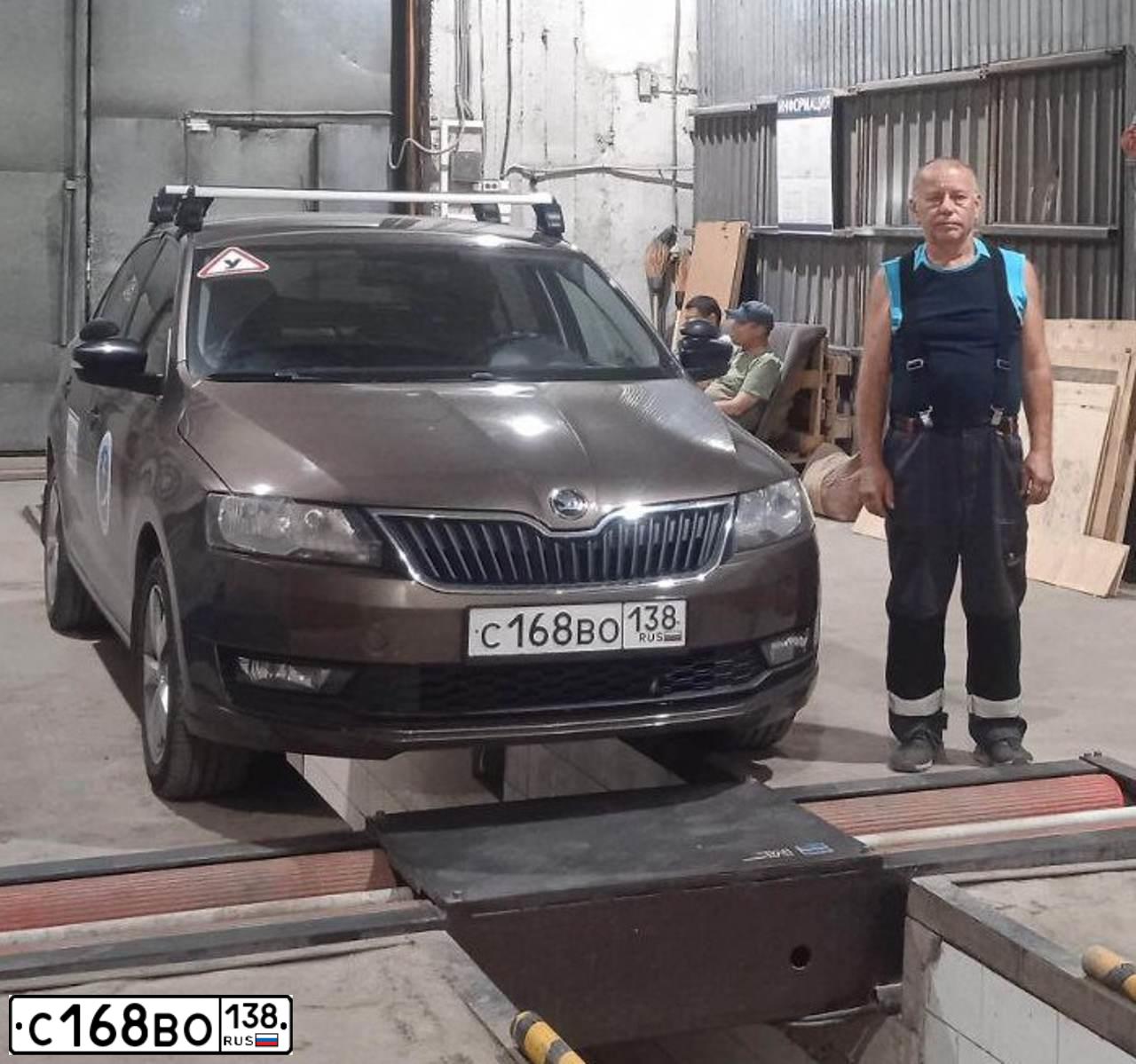 Фото автомобиля SKODA RAPID, 2018 — госномер С168ВО138. Цвет: Коричневый